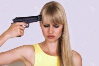 30124978-woman-puts-gun-to-head-with-depressed-look.jpg