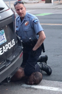 George Floyd neck knelt on by police officer 1