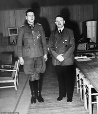 5698158-6345751-Hitler_s_right_hand_man_dwarfing_him_in_stature_pictured_in_1943-a-12_15459071...jpg