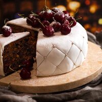 Christmas-Cake-decorated-with-fondant-marzipan-and-cherries-SQ.jpg