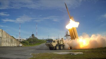 The first of two Terminal High Altitude Area Defense THAAD interceptors is launched during a