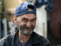 old-dirty-homeless-man-ugly-laughing-56824837.jpg