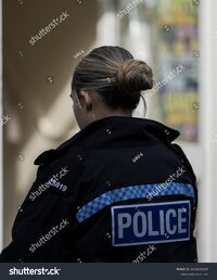 stock-photo-dudley-uk-street-photography-in-dudley-uk-with-a-female-police-officer-2216026207.jpg